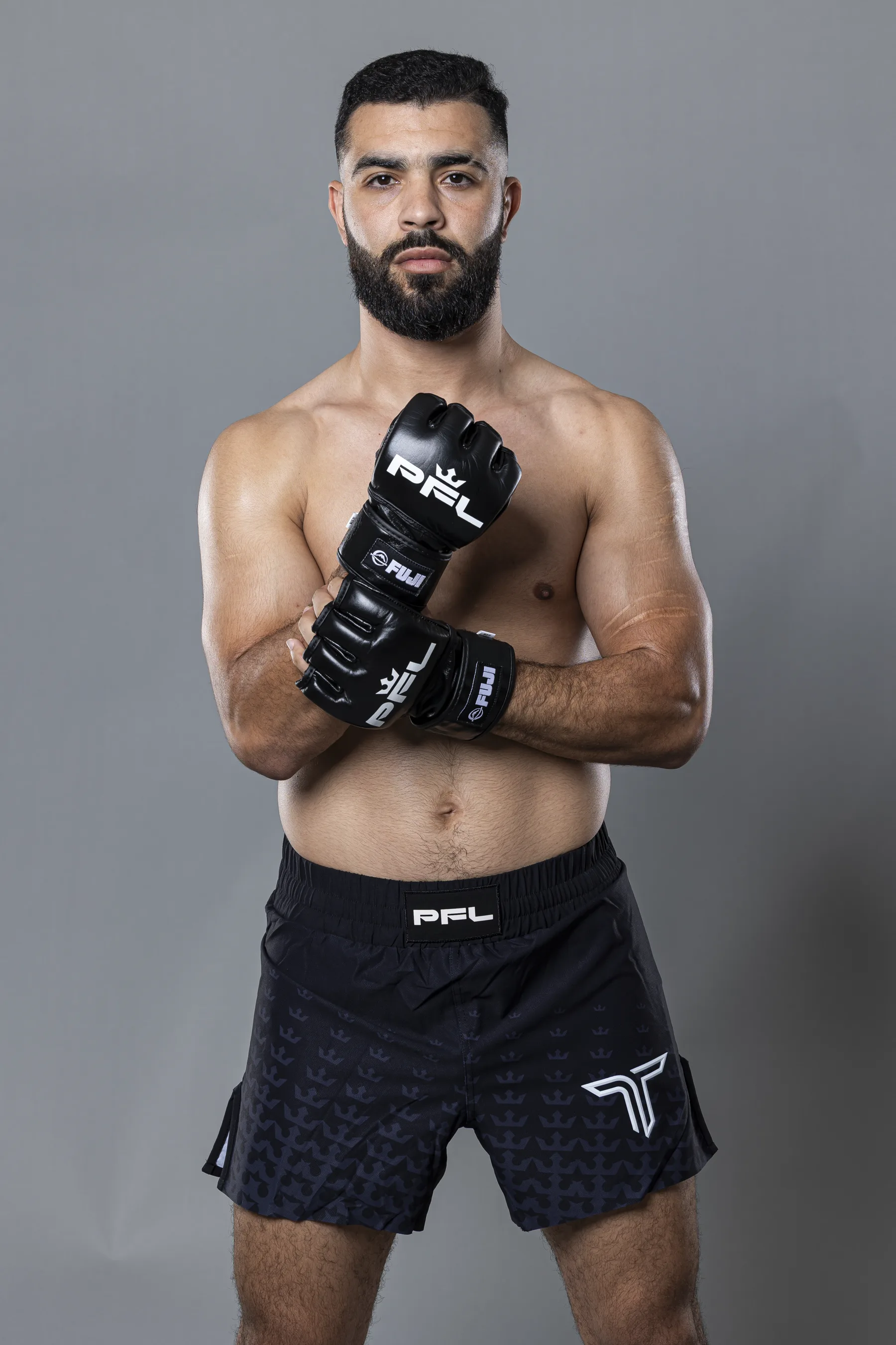 Zakaria Bichi wearing MMA gloves